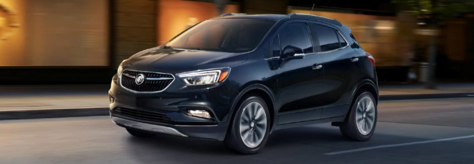 A 2019 Buick Encore driving down the street